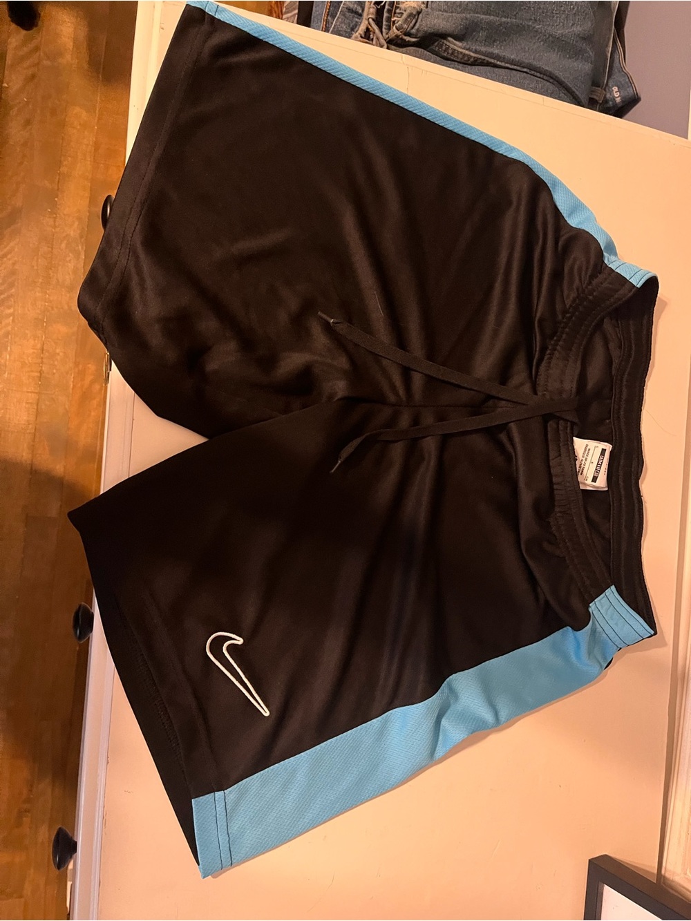 Nike Men’s Black Athletic Shorts with Blue Trim